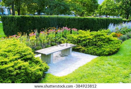 Bench in garden. Bench in public garden, Toronto, Canada   