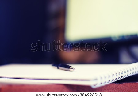toned man hand write pen paper