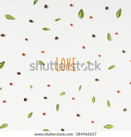 Colourful bright pattern made of natural things with "Love" message.
