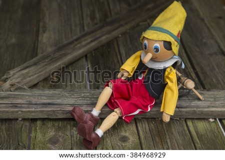 Old wooden marionette toy.