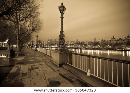 Vintage picture of South Bank of river Thames with Big Ben in the background 
