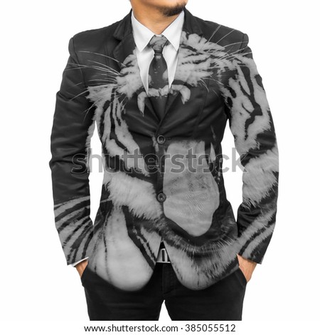 close up part of business man body in black suit with hands in pockets with overlay tiger face; isolated on white with clipping path.