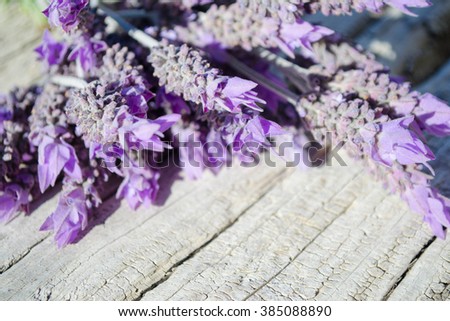 Lavender flowers on a wooden background