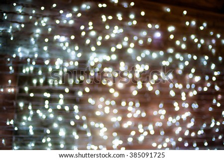White christmas lights background, abstract bokeh lights.