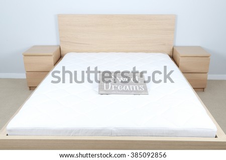 Bedroom interior with sign "sweet dreams"
