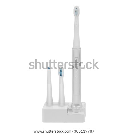 Ultrasonic toothbrush or sonic toothbrush or electric toothbrush with two replacement heads isolated on white background