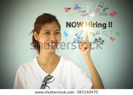 young woman smiling and hand pointing at NOW HIRING concept , business concept , business idea 
