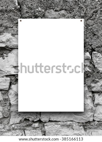 Close-up of one paper sheet frame with nails on grey ancient stone wall background