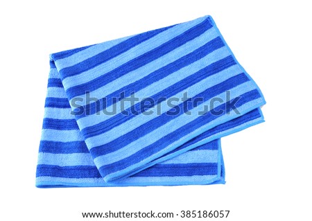Folded Beach Towel, striped cloth set isolated on white background. Royalty-Free Stock Photo #385186057