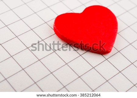 Heart on a checked notebook