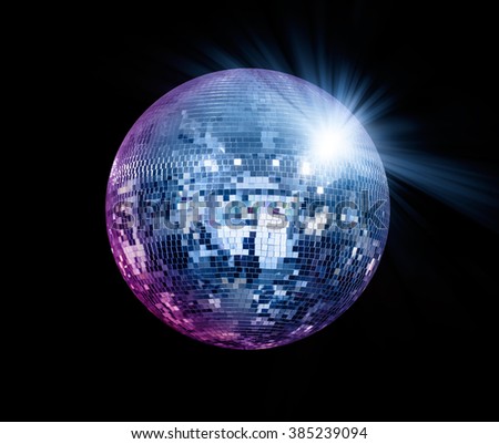 Party disco mirror ball reflecting green lights  Royalty-Free Stock Photo #385239094