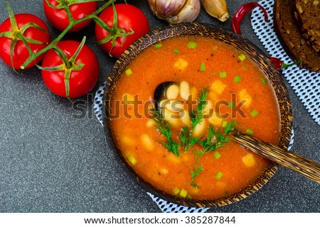 Sicilian Tomato Soup with White Beans. National Italian Cuisine. Studio Photo