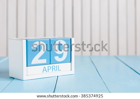April 29th. Image of april 29 wooden color calendar on white background.  Spring day, empty space for text. International or World Dance Day