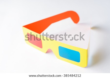 3D Glasses in a yellow frame on a white pedestal