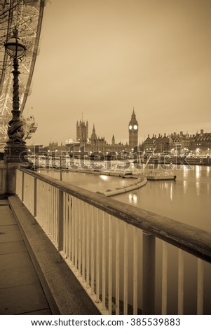 Vertical vintage view of Big Ben from Queen's walk in London, England