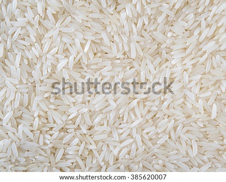 Close up of grains of jasmine rice Royalty-Free Stock Photo #385620007