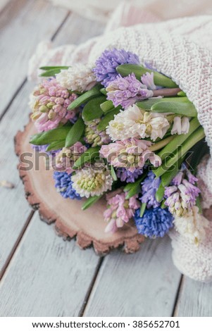 bouquet of hyacinth on wooden boards
