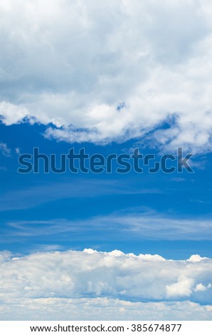 white fluffy clouds in the blue sky