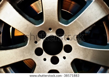 aluminum alloy wheel for a car for the road shiny gold with a blue tint