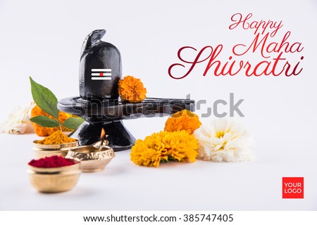 Happy Maha Shivaratri greeting card -
 Shiva Linga decorated with flowers & bel patra/leaf and haldi kumkum for Pooja/worshipping of Shankar bhagwan. Royalty-Free Stock Photo #385747405