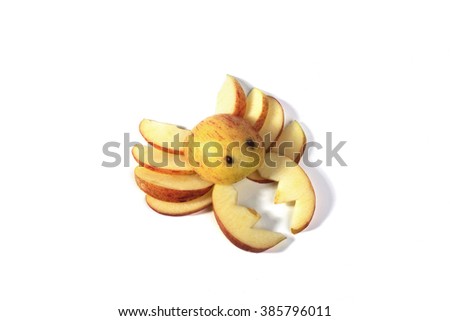 Food art, delicious crab made of apples isolated on white background