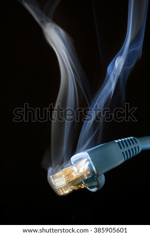 Smoke that is rising from a network connection with a black background