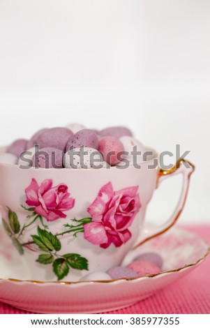 Easter chocolate mini eggs in a bone china tea cup painted with pink roses
