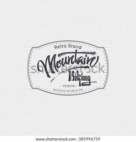 Mountain biking sign  handmade differences, made using calligraphy and lettering It can be used as insignia badge logo design cycling sports club