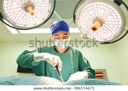 veterinarian surgery in operation room 