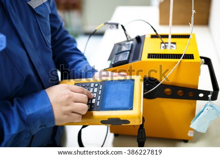 Calibration thermocouple with documenting process calibrator Royalty-Free Stock Photo #386227819