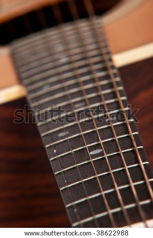 Wooden Acoustic guitar isolated on white background