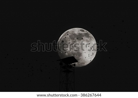 Silhouette Tower  and moon