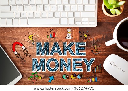 Make Money concept with workstation on a wooden desk 