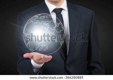 Man as if holding shining image of Earth on hand. Breast view. Concept of mental activity.