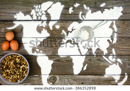 Drawing maps of the world with flour Beautiful backdrop of the flour in the form of a map of the world