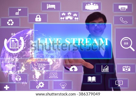 LIVE STREAM  concept  presented by  businessman touching on  virtual  screen ,image element furnished by NASA