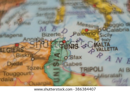 Photo of a map of Tunisia and the capital Tunis .