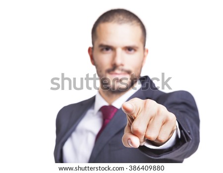 Executive man pointing the finger at you, isolated on white background