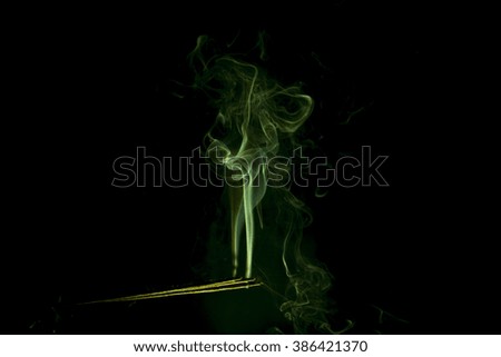 Abstract green abstract smoke on the black background