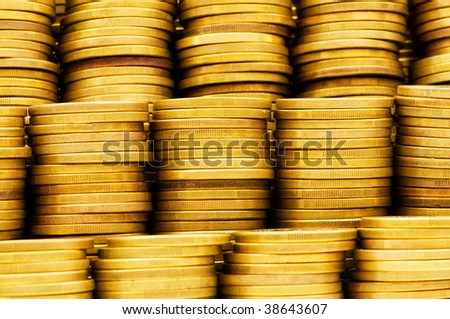 Pile of golden  coins isolated on white