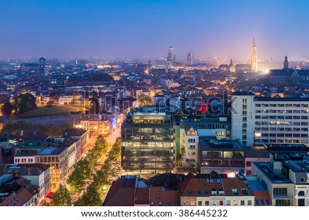 Antwerp City, Aerial View Cityscape Panorama Skyline with cathedral of our lady, St. Paul's Church at night under haze, Belgium