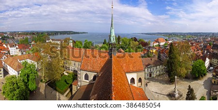 Panoramic aerial view of Konstanz city, Germany (on the Left) and Town of Kreuzlingen, Switzerland (on the Right). Boden lake on the bachground Royalty-Free Stock Photo #386485054