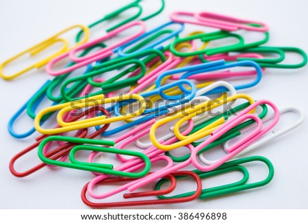 Colorful paper clip isolated on white background