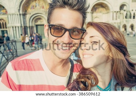 A loving couple take a self-ie on Holiday - people,lifestyle and outdoor concept