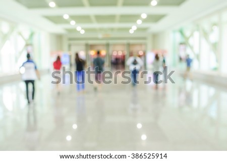 Blurred shopping mall and peple background.