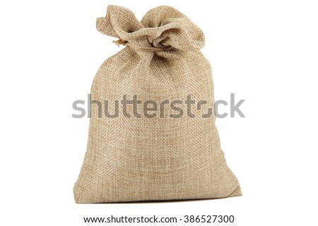 Textile - burlap sack isolated on white background with empty space Royalty-Free Stock Photo #386527300
