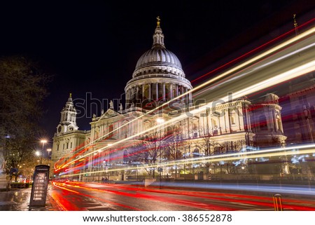St Paul's Cathedral in London. Night shooting with slow shutter speed and light trails from cars and busses.  London, England, UK