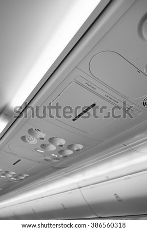 Italy, airplane cabin with no smoking sign on
