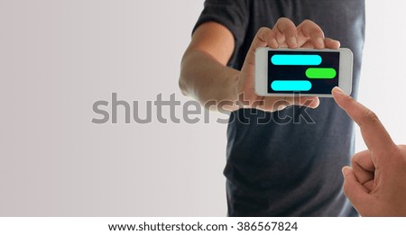 a man using hand holding the smartphone with blank message template