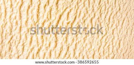 Panoramic Abstract Texture Background - Close Up of Ridges in Surface of Creamy, Sweet and Cold Vanilla Bourbon Frozen Dairy Ice Cream Dessert